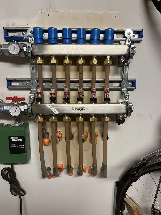 Plumber performing Water Heater Repair at a residential property in Northampton